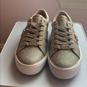 Gold G by Guess sneakers.